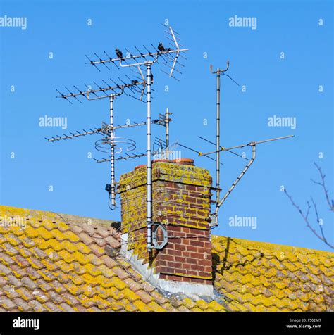 TV antennas (television aerials) on a chimney stack on a house in Stock Photo: 89127255 - Alamy