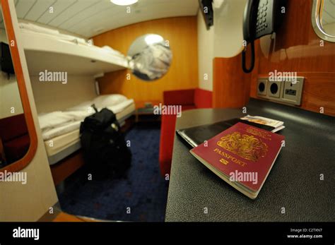 Cabin on Harwich - Hoek van Holland ferry. Passport and Euros on table Stock Photo - Alamy