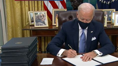 President Biden Signs Over A Dozen Executive Orders To Overturn Donald ...