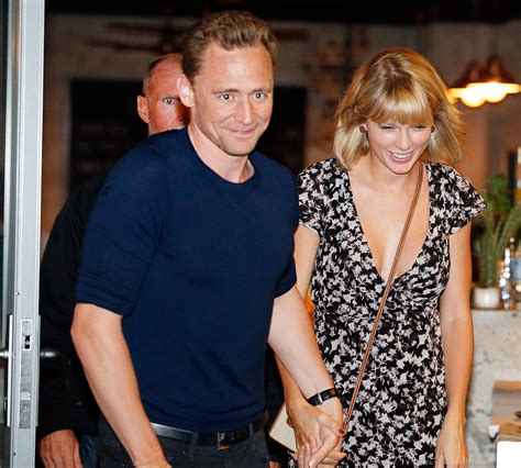 Tom Hiddleston Runs Past Taylor Swift Street Art in London