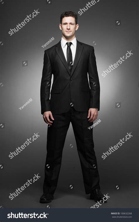 Young Handsome Business Man In White Shirt And Black Suit. Stock Photo 100632268 : Shutterstock