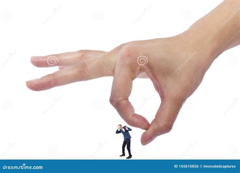 Tiny Man Trapped and Being Held by Giant Female Hands Stock Photo ...