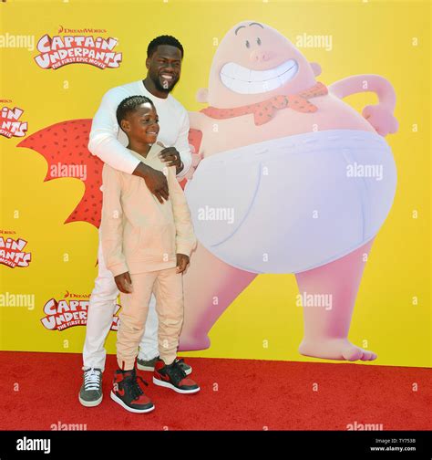 Kevin Hart and his son Hendrix arrive at the premiere of 'Captain ...