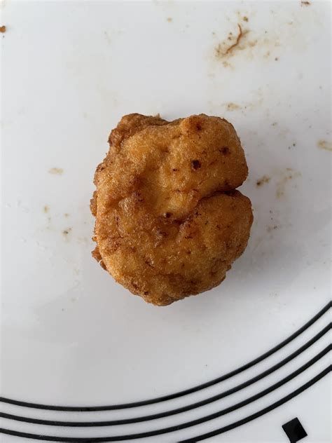 My chicken nugget looks like a worried face : r/mildlyinteresting