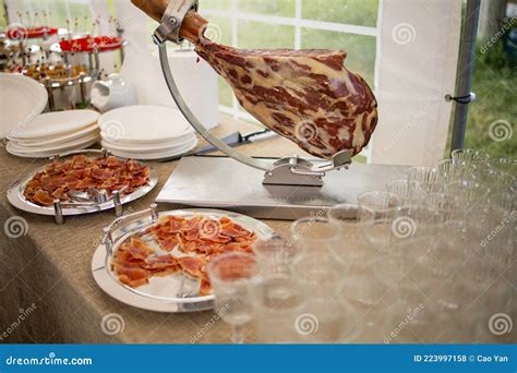 Traditional Spanish Ham in the Market Close Up. Pork Leg Ham on Stock Photo - Image of customer ...