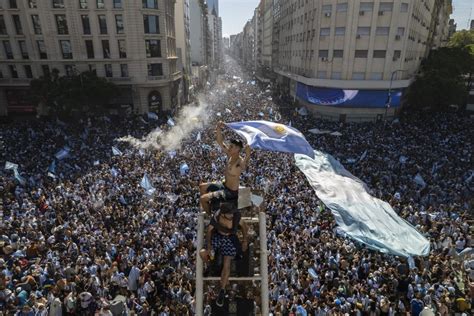 Joyful Argentines celebrate on streets of Buenos Aires after epic World ...