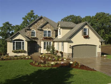 Stucco Rock theultimatehomesolutions.com | Exterior house color ideas | Pinterest | Dark brown ...