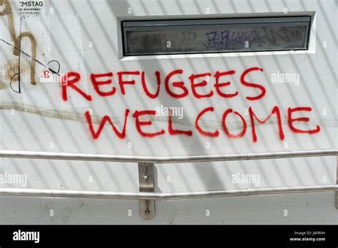 Refugees Welcome graffiti, Vienna, Austria, Europe Stock Photo - Alamy