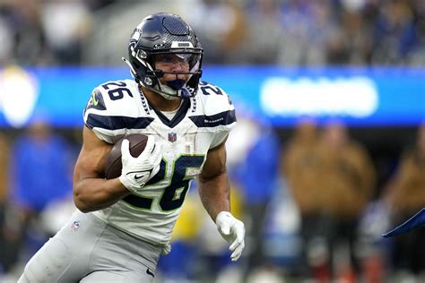 Should you start Zach Charbonnet? Seahawks RB's fantasy outlook, trade options explored ...