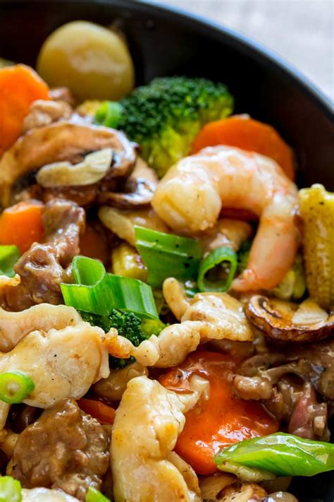 This Happy Family Stir Fry recipe is a wonderful combination of beef, chicken and shrimp, all ...