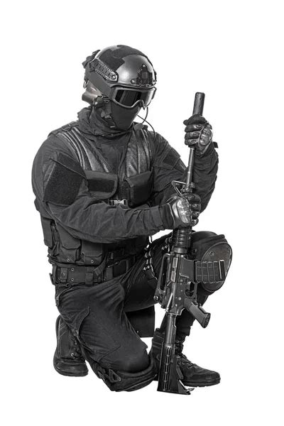 SWAT officer with ballistic shield Stock Photo by ©zabelin 86373424