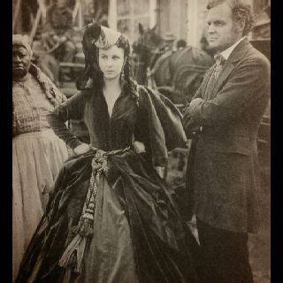 Vivian Leigh as Scarlett with Carroll Nye as Frank Kennedy. He was really handsome, but they ...