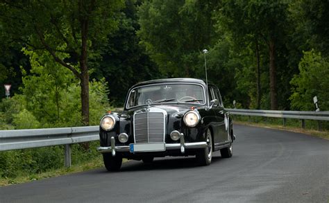 Black Mercedes Benz Convertible on Gray Concrete Floor · Free Stock Photo