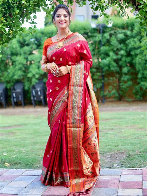 Maroon color paithani silk saree with zari weaving work