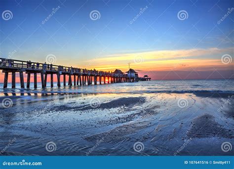 Naples Pier on the Beach at Sunset Stock Photo - Image of tropical, range: 107641516