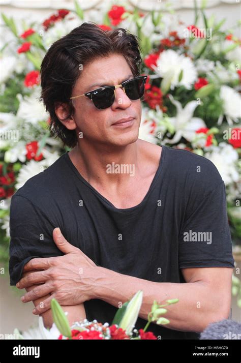 Shahrukh Khan portrait goggles black tshirt arms crossed on his 49th birthday in Mumbai India ...