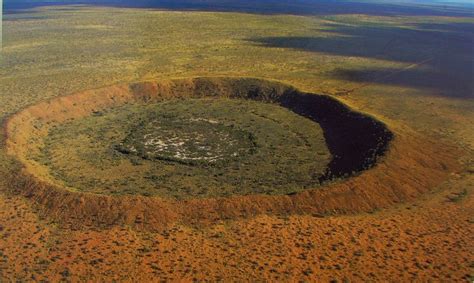 Wolfe Creek Crater is a well-preserved meteorite impact crater in ...