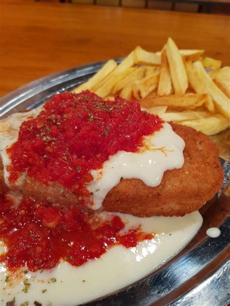 Arriba 41+ imagen receta de milanesa de pollo rellena de jamon y queso ...