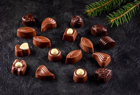 Belgian Chocolate Pralines in Golden Box Stock Photo - Image of bonbon ...