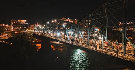 Illuminated bridge in city at night · Free Stock Photo