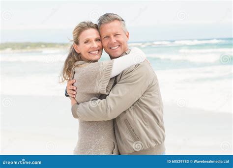 Happy Couple Holding Each Other Stock Image - Image of couple, outdoors: 60529783