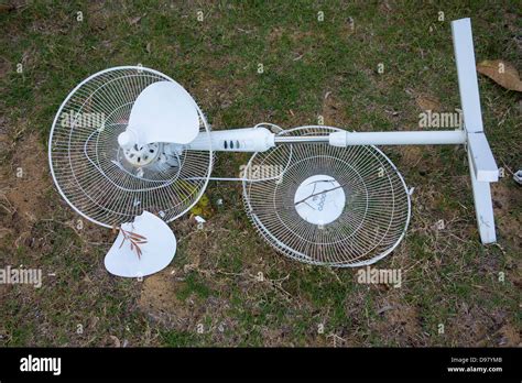 A discarded electric fan Stock Photo - Alamy