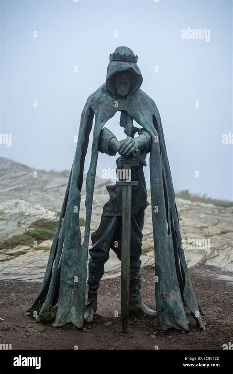 Bronze Sculpture of King Arthur Stands In Tintagel Castle Cornwall UK July 8 2020 Stock Photo ...