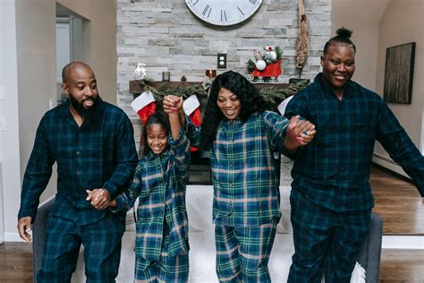 Happy black family having Christmas celebration together · Free Stock Photo