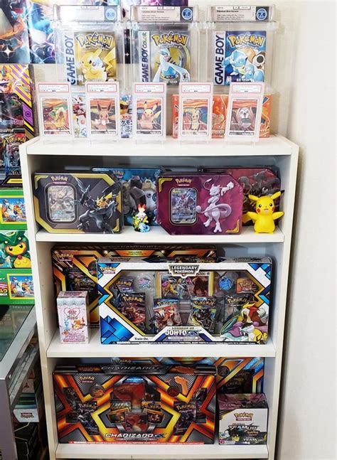 Updated my pokemon card display shelves! I am super proud of how it ...