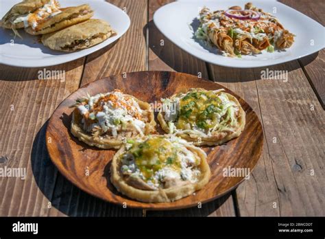 variety of Mexican food dishes. sopes, tacos, gorditas stuffed Stock Photo - Alamy