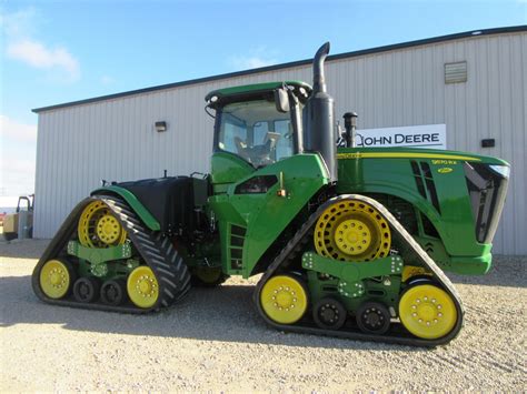 John Deere 4 -Track RX Savings From $40,900/y $70/h