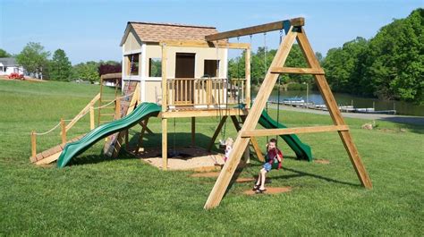 Pin by Playhouses for the Imagination on Playhouses | Swing set playhouse, Swing set diy, Build ...