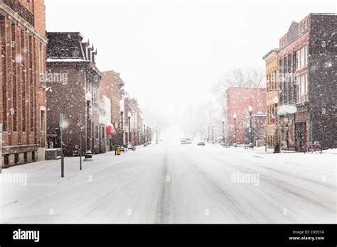 Snow falling on city street Stock Photo: 48562426 - Alamy