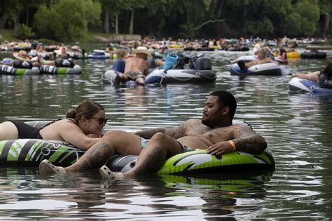 Photos: Tubing along Guadalupe River on hot July day lures in Texans