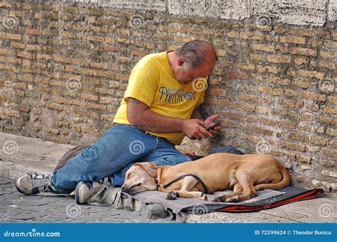 Beggar man and a dog editorial stock image. Image of lifestyle - 72299624