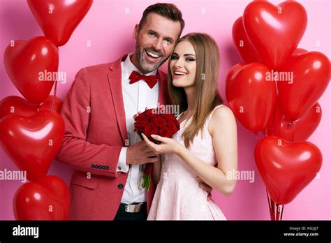 Portrait of affectionate couple celebrating valentine's day Stock Photo - Alamy