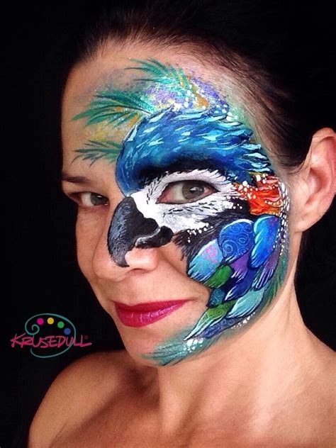 Parrot face paint | Professional face paint, Creative makeup, Makeup art