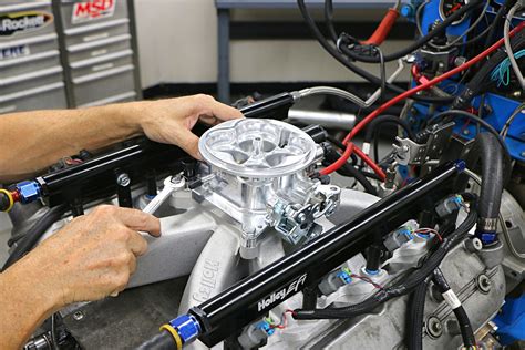 Carburetor vs. Fuel Injection. We Put Both to the Test on an LS Engine