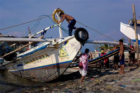 SLIDESHOW: A community in Philippines' fishing capital Navotas adjusts ...