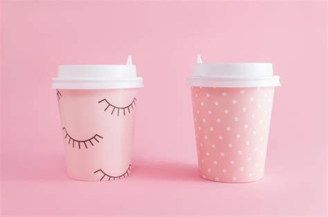 Premium Photo | Two glass of coffee take-away on pink pastel background