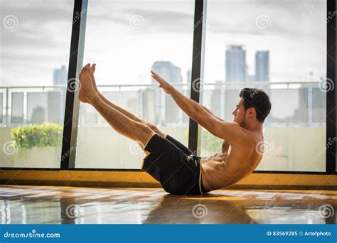 Handsome Young Man Doing Abs Exercises on Mat Stock Image - Image of abdominals, adult: 83569285