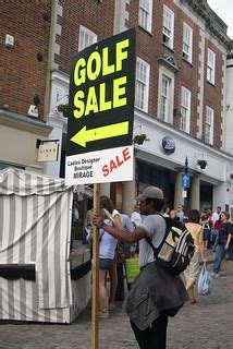 Golf Sale Man #1 | Bloke directing shoppers down an alley wa… | Richard Cocks | Flickr