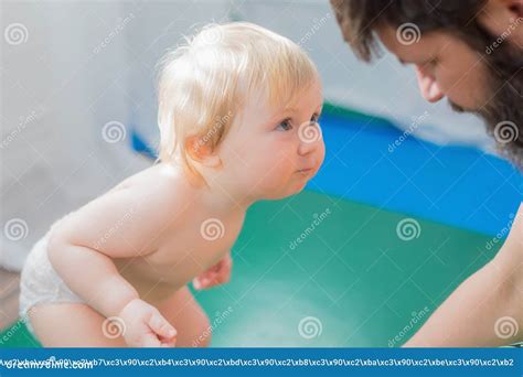 The Kid Sat Down and Carefully Looked Dad in the Eyes. Stock Photo ...