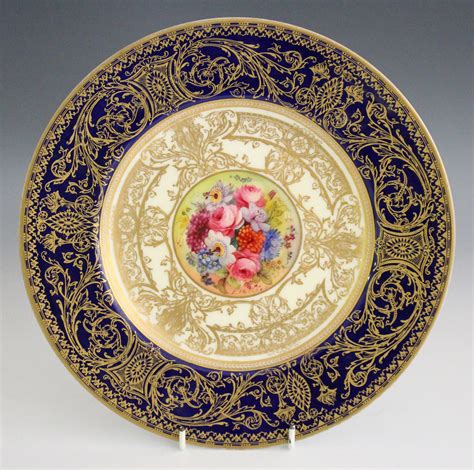 A Royal Worcester porcelain cabinet plate, circa 1926, painted by Ernest Phillips, signed, with flow