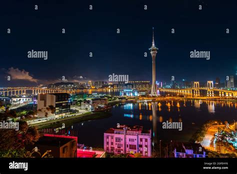 View of Macau Tower Convention and Entertainment Center at night, Macao ...