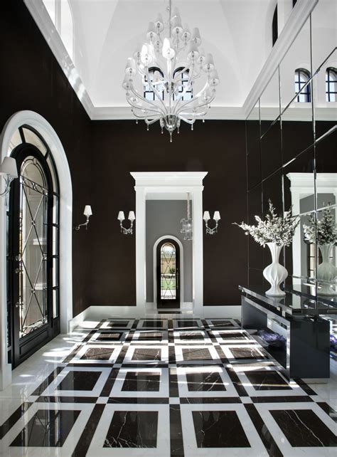 This mesmerizing black and white hallway was completed by Salcito Custom Homes. #luxeAZ Classic ...