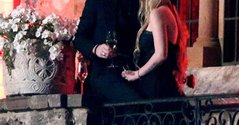 Avril Lavigne Black Wedding Dress Picture: Singer Watches Fireworks - Us Weekly