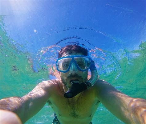 Chris Taylor snorkeling in Cabo - 2TravelDads