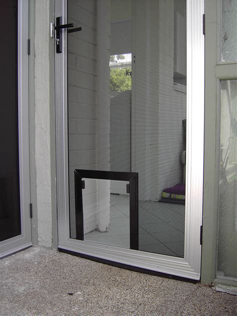 How To Install A Dog Door In A Screen Door - DIY