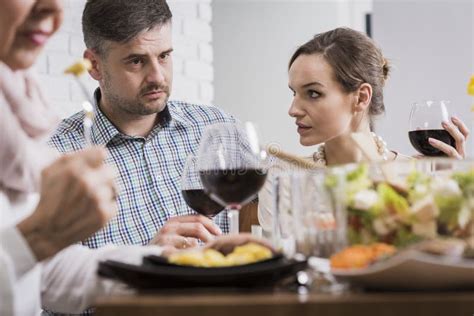 Couple Arguing during Family Dinner Stock Photo - Image of meeting, sunday: 82541394